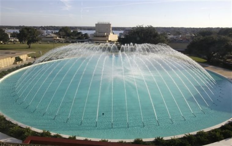 This photo taken Jan. 28, 2010 shows the water dome fountain that was designed by Frank Lloyd Wright,  at Florida Southern College in Lakeland, Fla. The Florida Southern College campus is home to the world's largest single-site collection of Frank Lloyd Wright architecture.(AP Photo/Julie Fletcher)